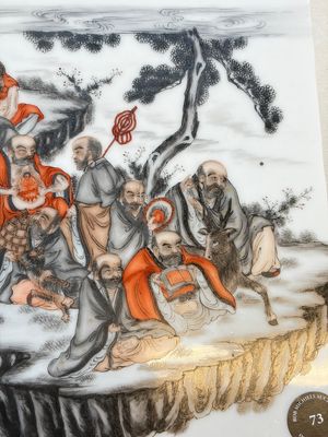 A Chinese grisaille and iron-red decorated '18 Luohan' plaque, Qianlong mark, 20th C. — photo 3