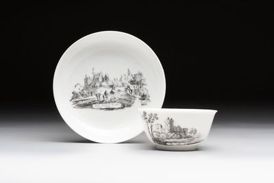 A Chinese grisaille 'Haarlem, Leersum and Liesveld' cup and saucer, Qianlong