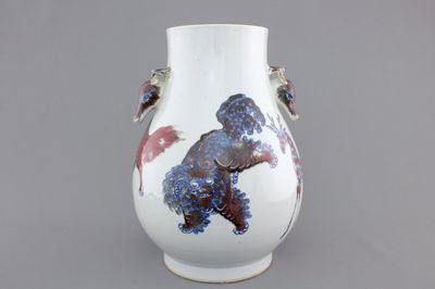 A Chinese hu-shaped deer-handled underglaze red and blue vase with finely painted animals, ca 1900