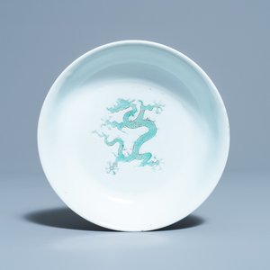 A Chinese incised and green-glazed 'dragon' dish, Hongzhi mark, Ming — photo 1