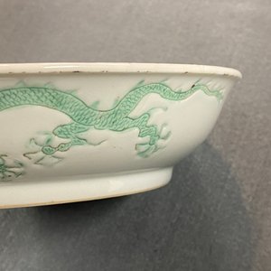 A Chinese incised and green-glazed 'dragon' dish, Hongzhi mark, Ming — photo 12