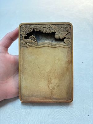 A Chinese ink stone with phoenix and carp design, Qianlong mark and possibly of the period — photo 1