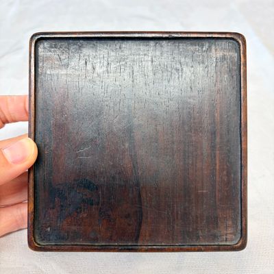 A Chinese inkstone with hongmu cover and stand, a boxwood carving, a bamboo brushpot and an incense tube — 照片 26