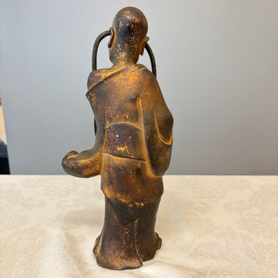 A Chinese inscribed lacquered gilt-bronze figure of a luohan — photo 10