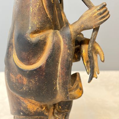 A Chinese inscribed lacquered gilt-bronze figure of a luohan — photo 19