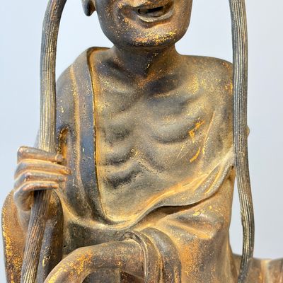 A Chinese inscribed lacquered gilt-bronze figure of a luohan — photo 3