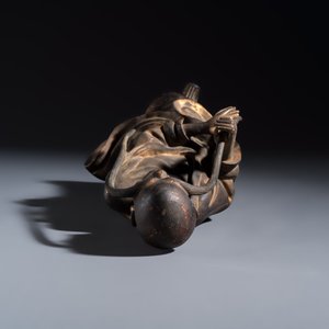 A Chinese inscribed lacquered gilt-bronze figure of a luohan — photo 6