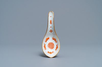 A Chinese iron red and gilt 'bats and Shou' spoon, Jiaqing mark and of the period