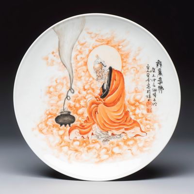 A Chinese iron-red and grisaille-decorated dish, in the style of Wang Bu 王步, 20th C.
