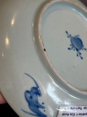 A Chinese iron-red 'bat' saucer and a black-glazed 'ship' saucer with calligraphy, Guangxu mark, 19th C. — photo 19