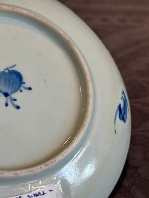 A Chinese iron-red 'bat' saucer and a black-glazed 'ship' saucer with calligraphy, Guangxu mark, 19th C. — photo 20