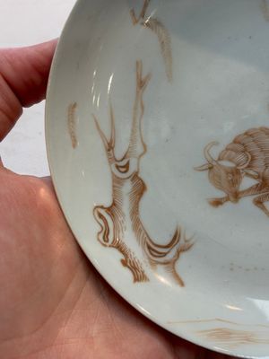 A Chinese iron-red-decorated 'boy and buffalo' cup and saucer and a famille rose 'Xi Xiang Ji' cup and saucer, Qianlong — photo 11