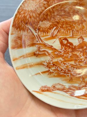 A Chinese iron-red-decorated 'Deer Hunting' cup and saucer, Qianlong — photo 2