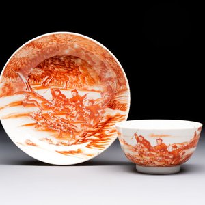 A Chinese iron-red-decorated 'Deer Hunting' cup and saucer, Qianlong — photo 1