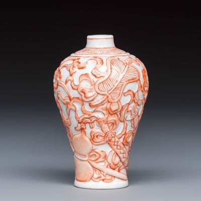 A Chinese iron-red-decorated relief-moulded 'An Ba Xian 暗八仙' snuff bottle, Daoguang mark, 19/20th C.