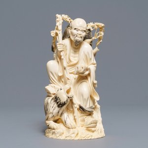 A Chinese ivory group of a sage with a tiger, 19/20th C. — 照片 1
