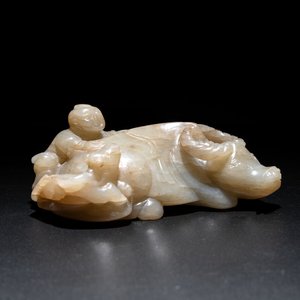 A Chinese jade 'boy on a buffalo' group, Qing — photo 1
