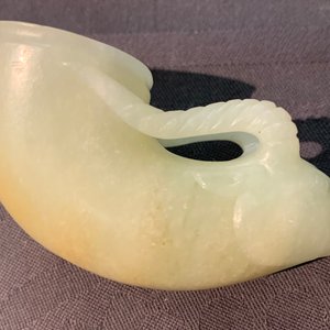 A Chinese jade deer rhyton cup and a spinach green jade pig, Han or later — 照片 16