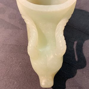 A Chinese jade deer rhyton cup and a spinach green jade pig, Han or later — 照片 17