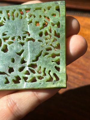 A Chinese jade 'dragon' plaque, a 'double-happiness' plaque and a jade inset silver brooch, 19th C. — photo 20