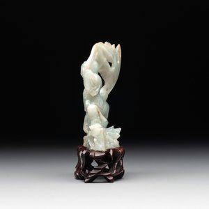A Chinese jade 'He He Er Xian' group on wooden stand, 19th C. — photo 3