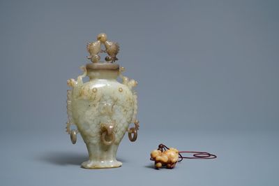 A Chinese jade 'twin fish' vase and a russet jade model of a dog, 19/20th C.