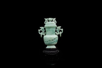 A Chinese jade vase and cover, Qing