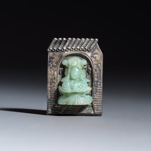 A Chinese jadeite-inlaid silver 'Guanyin' clip — photo 1