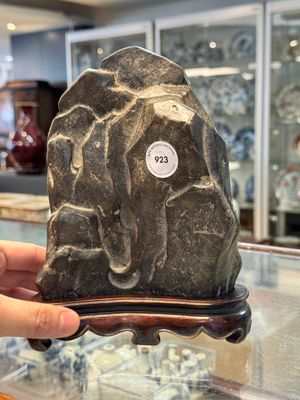 A Chinese Lingbi stone scholar's rock on wooden stand, Yun Tai 雲台 mark, 19/20th C. — photo 1