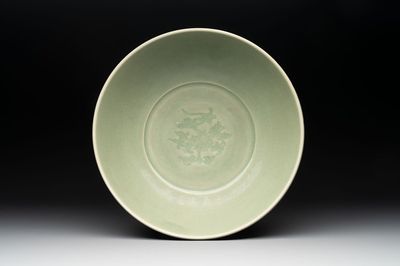 A Chinese Longquan celadon bowl with 'anhua' floral design, Ming