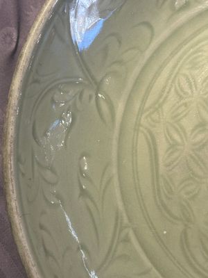 A Chinese Longquan celadon dish with floral design, Ming — photo 2