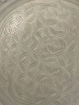 A Chinese Longquan celadon dish with floral design, Ming — photo 3
