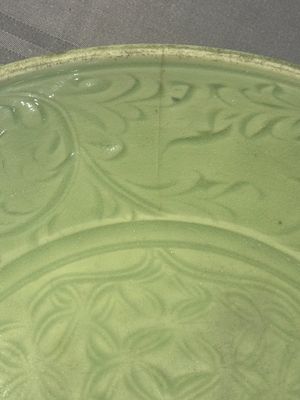 A Chinese Longquan celadon dish with floral design, Ming — photo 5