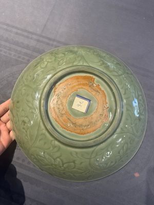 A Chinese Longquan celadon dish with floral design, Ming — photo 6