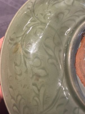 A Chinese Longquan celadon dish with floral design, Ming — photo 7