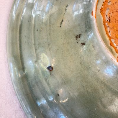 A Chinese Longquan celadon dish with incised floral design — photo 11