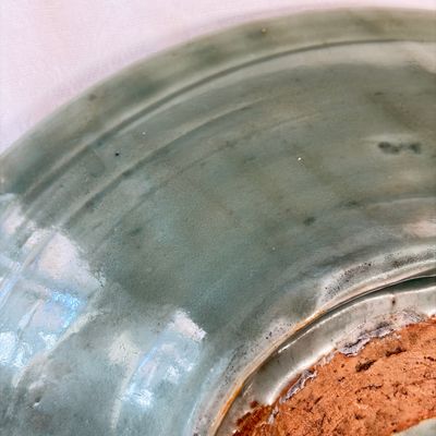 A Chinese Longquan celadon dish with incised floral design — photo 12