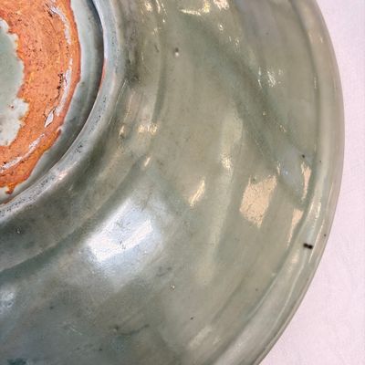 A Chinese Longquan celadon dish with incised floral design — photo 15