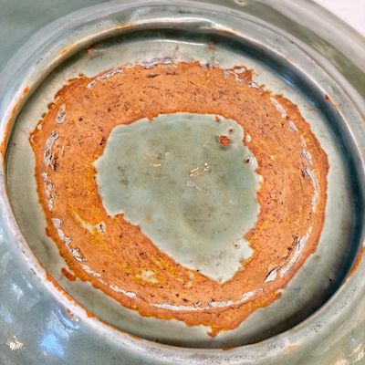 A Chinese Longquan celadon dish with incised floral design — photo 17