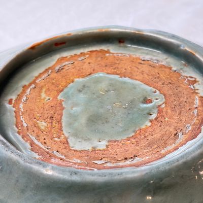 A Chinese Longquan celadon dish with incised floral design — photo 18