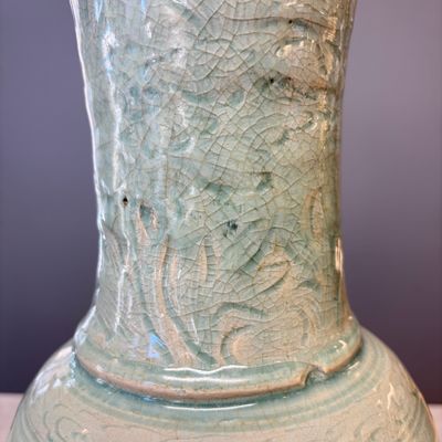 A Chinese Longquan celadon-glazed incised 'Peony' yenyen vase — photo 13