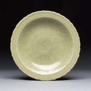 A Chinese Longquan celadon inscribed dish with incised floral design, Ming — photo 1