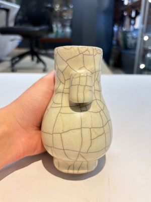 A Chinese Longquan celadon jar and a small Ge-type 'Hu' vase, Song and later — photo 13