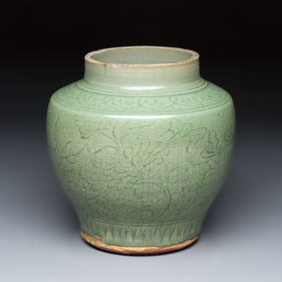 A Chinese Longquan celadon jar with an incised floral design, Ming