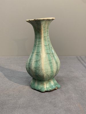 A Chinese Longquan celadon lobed bottle vase, Song — photo 1