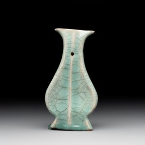 A Chinese Longquan celadon lobed bottle vase, Song — photo 3