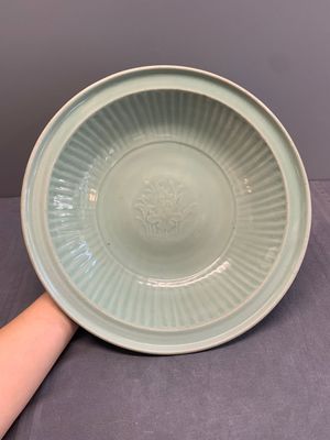 A Chinese Longquan celadon 'lotus' dish, Ming — photo 1