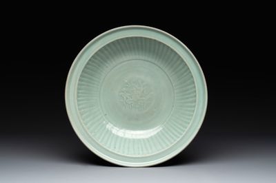 A Chinese Longquan celadon 'lotus' dish, Ming