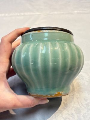 A Chinese Longquan celadon 'Lotus' jar with bronze mount, Song — photo 1