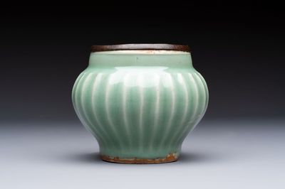 A Chinese Longquan celadon 'Lotus' jar with bronze mount, Song